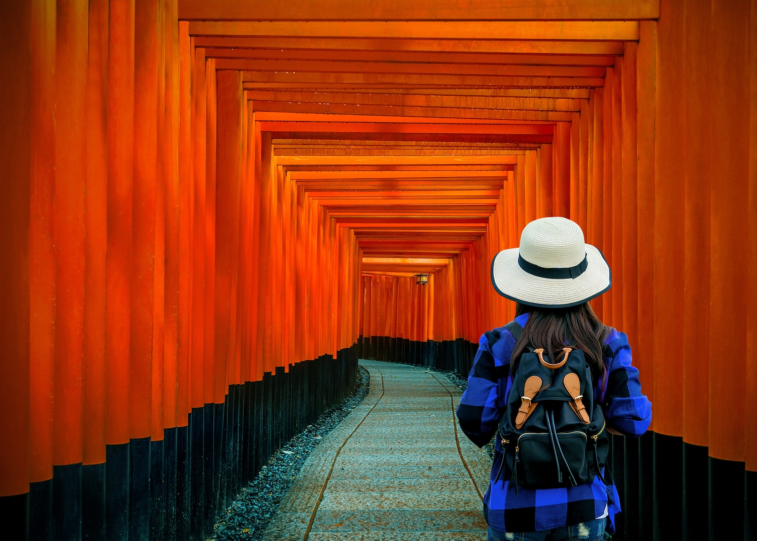 Adobe Stock #287611096 Fushimi Inari Taisha red gates Shinto shrine woman sightseeing, Kyoto, Japan
