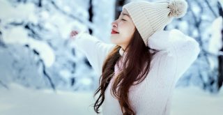 Adobe Stock 249493769 Young Asian woman enjoying the snow, Sapporo, Hokkaido, Japan