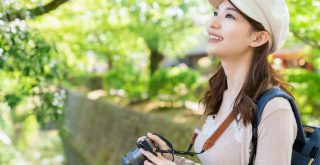 Adobe Stock #294785524 Asian female sightseeing taking photos, Kyoto, Japan